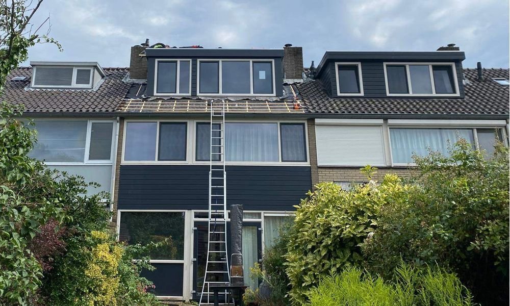 Wat kost een plat dak herstellen in Almelo?
